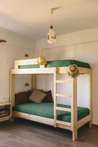 a bunk bed in a room with a bunk bed frame at Villa Melivia in Hersonissos