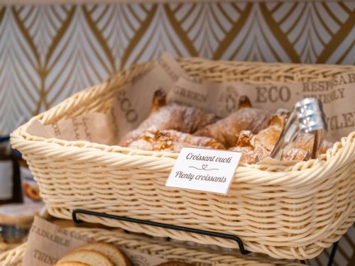 a basket of pastries sitting on a table at Hotel Ca' De Berna in Balestrino