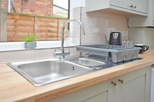 Køkken eller tekøkken på Broad House - By Sigma Stays