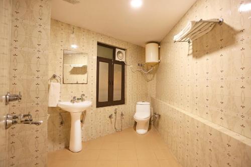 Vannituba majutusasutuses Hotel O Ravin