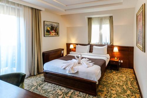 Voodi või voodid majutusasutuse Hotel & Spa PALIĆ RESORT toas