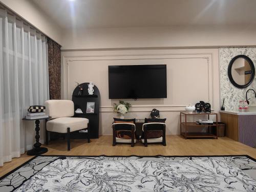 TV a/nebo společenská místnost v ubytování Rooftop B&B