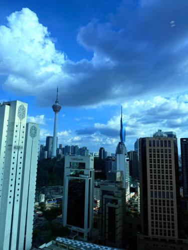 a view of a city skyline with buildings at The Luxe Colony KLCC By AZHA in Kuala Lumpur