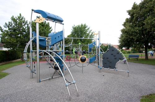 a park with a playground with a play equipment at Hotel OUM EL FADL in Fkih Ben Salah