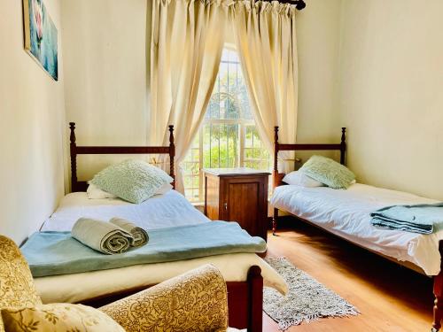 Postel nebo postele na pokoji v ubytování Patches Place