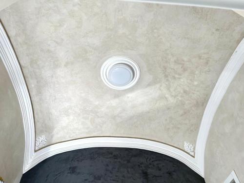 a ceiling with a hole in the middle at Charming of Olhao2 in Olhão