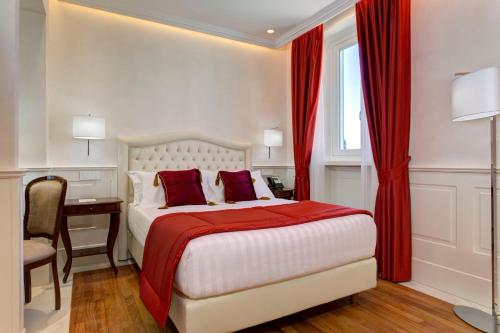 Letto o letti in una camera di Hotel Degli Artisti