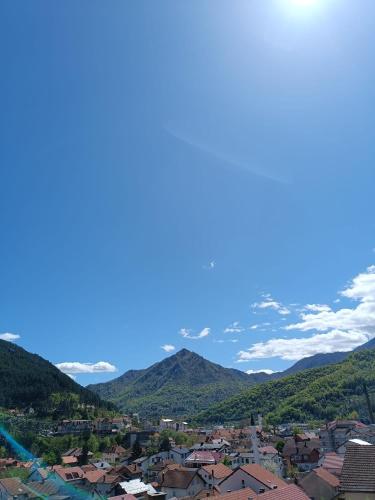 a view of a town with mountains in the background at Apartment Stari Pazar 2 in Konjic