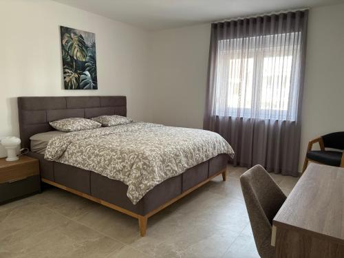 Postel nebo postele na pokoji v ubytování Apartment deluxe