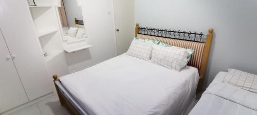 Postel nebo postele na pokoji v ubytování YUYU A12 Honeymoon GVR GENTING HIGHLAND