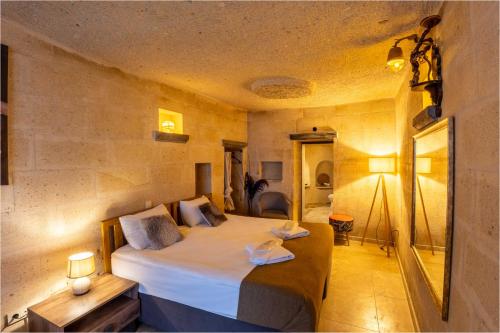 Carmin Cave Hotelにあるベッド