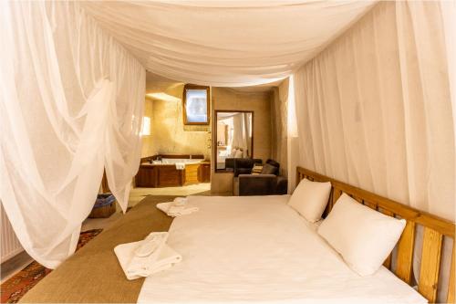 Carmin Cave Hotelにあるベッド