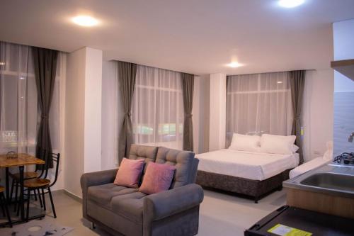 Postel nebo postele na pokoji v ubytování Apartamento tipo loft