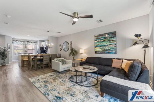 a living room with a couch and a table at The Epic Colorado Vista Cay Orlando in Orlando