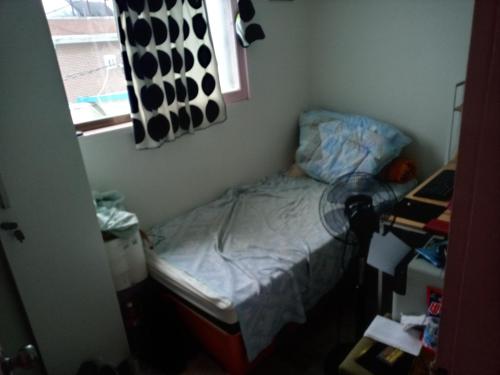 a small bedroom with a small bed and a window at Ocean House - Ipjang in Cheonan