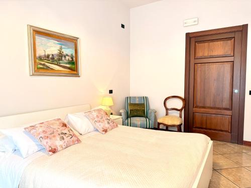 Ένα ή περισσότερα κρεβάτια σε δωμάτιο στο Ferrari 44 - Dimora di Puglia