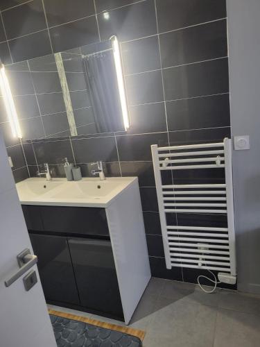 Koupelna v ubytování Bel appartement en RDC avec parking