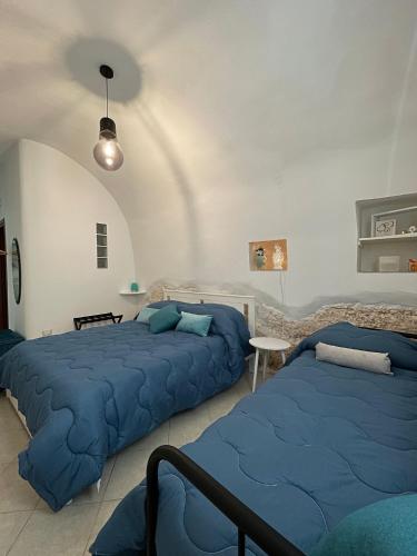 Ένα ή περισσότερα κρεβάτια σε δωμάτιο στο Casa DàStella