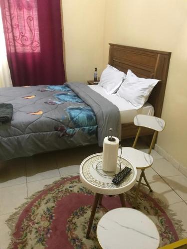 Llit o llits en una habitació de Chez Penda