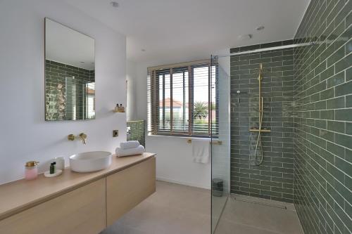 Ένα μπάνιο στο CHAMBRE D'HOTES Villa BIBICHERI