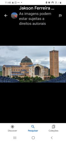 a screenshot of a website with a picture of a building at Hotel Aparecida do Norte in Aparecida