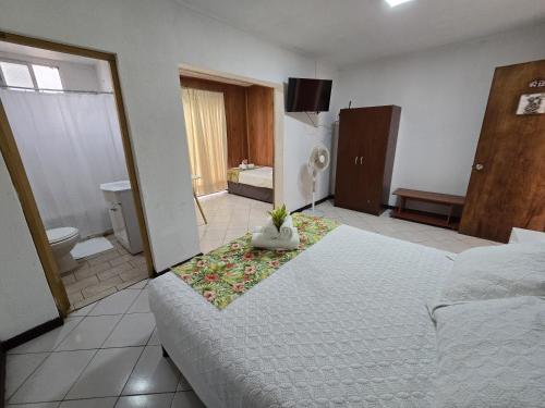 Postel nebo postele na pokoji v ubytování Hotel Hotu Matua by EI