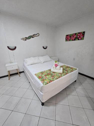 Postel nebo postele na pokoji v ubytování Hotel Hotu Matua by EI