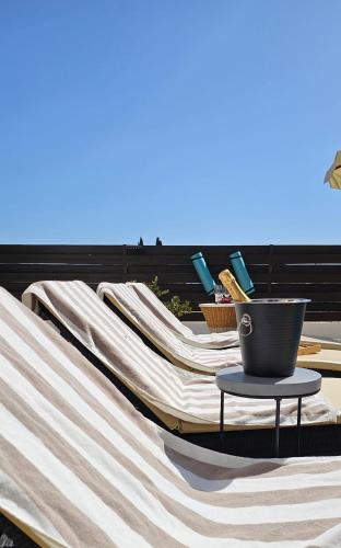 a table with a pot on top of a hammock at Villa Talya in Peyia