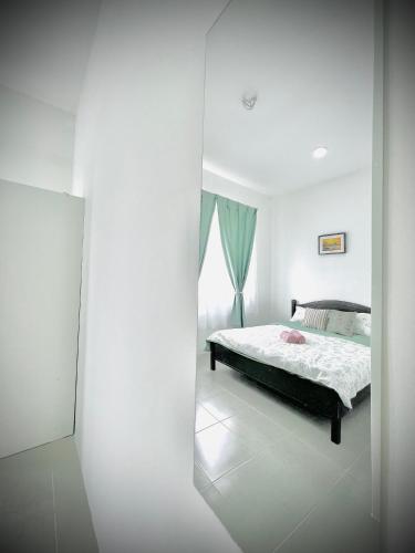 Katil atau katil-katil dalam bilik di N&N Modern Apartment