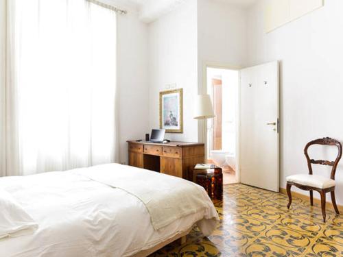 Un pat sau paturi într-o cameră la Viadelloca35