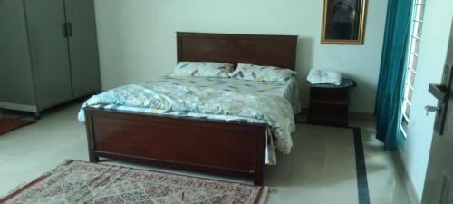 Cama o camas de una habitación en Capital Guest House, Islamabad near Bahria Town , Rawalpindi