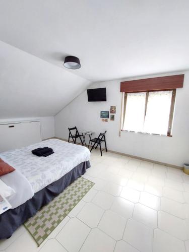 Letto o letti in una camera di Pensión El Pozo