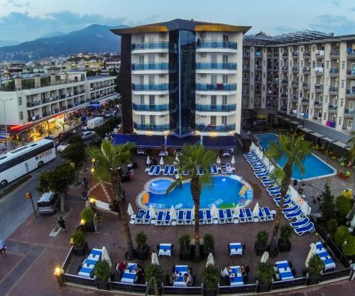 an aerial view of a hotel with a swimming pool at Parador Beach Hotel in Alanya
