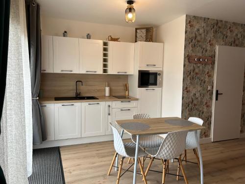 Photo de la galerie de l'établissement Studio cosy avec jardin et parking, à Fontaine-le-Comte