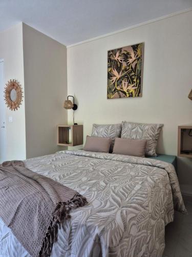 En eller flere senge i et værelse på Appartement vue mer