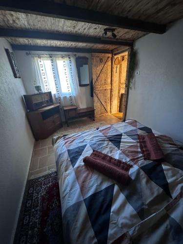 Postel nebo postele na pokoji v ubytování Etno House Šćepanov Hlad
