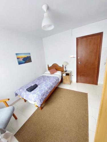 Letto o letti in una camera di Pensión El Pozo