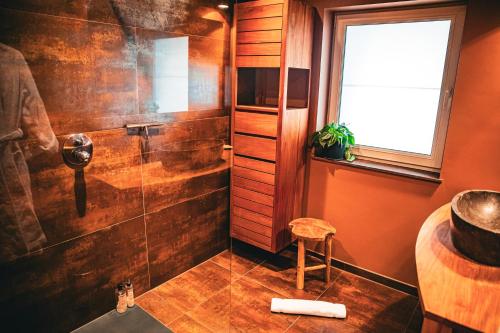 Ein Badezimmer in der Unterkunft Gîte Annexe 19