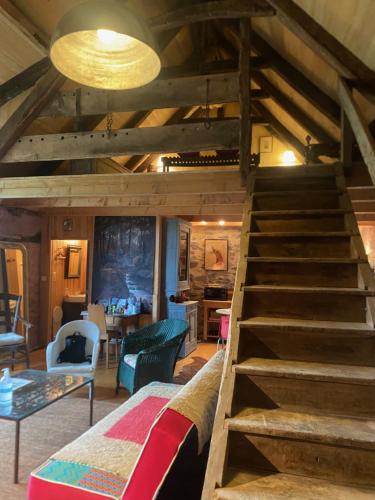 Χώρος καθιστικού στο Charmant gîte en pierre sur le chemin de St Jacques de Compostelle
