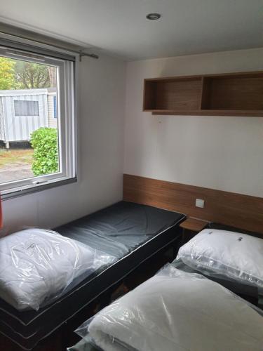 Postel nebo postele na pokoji v ubytování Détente et Lac