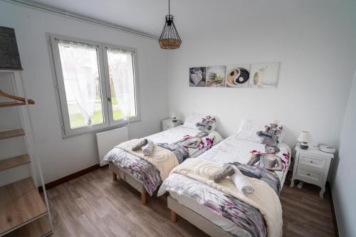 Postel nebo postele na pokoji v ubytování fleur de sel d Oléron 3 chambres
