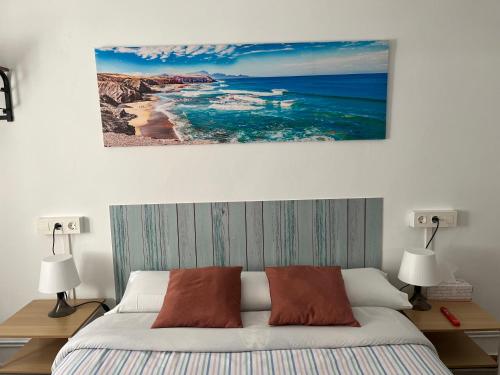 Letto o letti in una camera di Pensión El Pozo