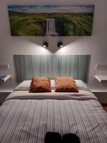 Letto o letti in una camera di Pensión El Pozo