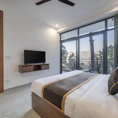 Postel nebo postele na pokoji v ubytování Kasauli Hill Crest