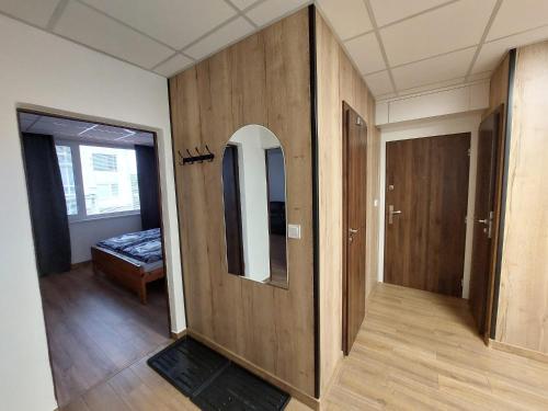 Кровать или кровати в номере Apartmán Discovery