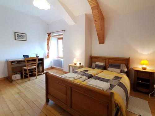 Un ou plusieurs lits dans un hébergement de l'établissement Au Bout du Monde