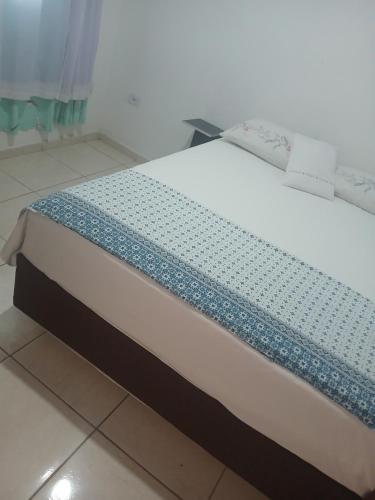 a mattress sitting on a floor in a room at Gust Hause Ilhabela in Ilhabela