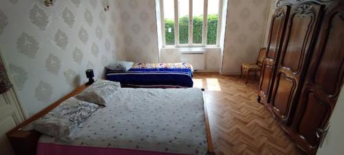 Postel nebo postele na pokoji v ubytování Gîte43