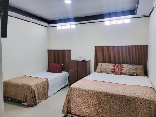 Postel nebo postele na pokoji v ubytování Casa Miraflores
