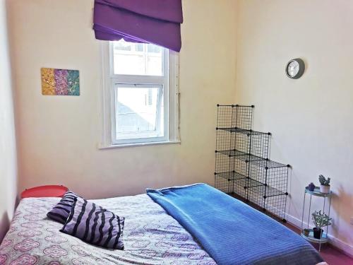 Cama o camas de una habitación en La Casa Piola